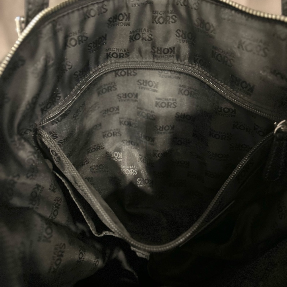 Michael Kors Black Tote Bag with MK logo throughout bag. - Picture 7 of 16